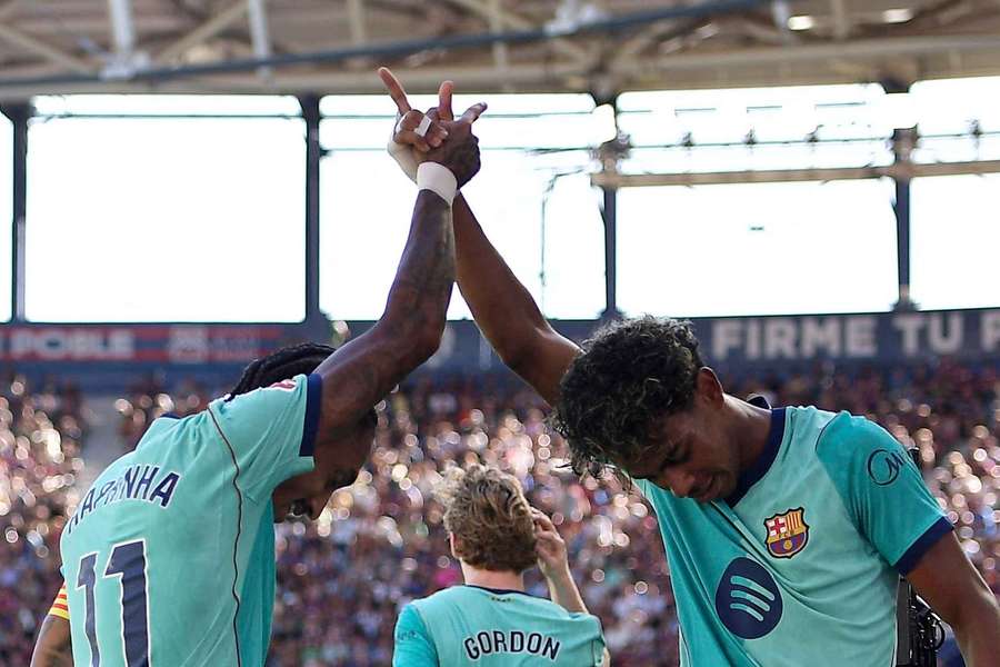 Lamine Yamal (right) celebrates scoring Barcelona's second goal with Raphinha Lamine Yamal (right) celebrates scoring Barcelona's second goal with Raphinha