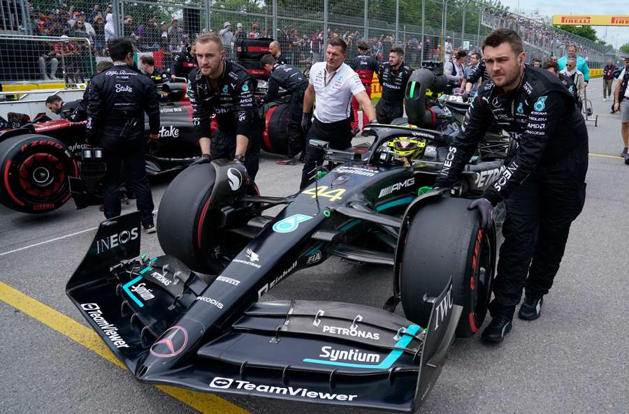 Lewis Hamilton is pushed into the starting grid as Mercedes plan upgrades to the car in time for Silverstone