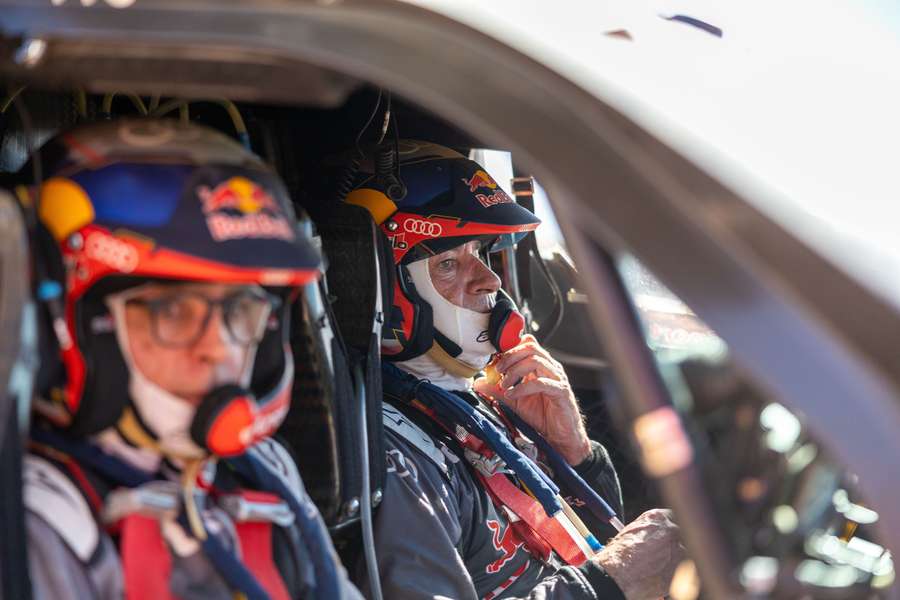 Carlos Sainz (R) en co-driver Lucas Cruz