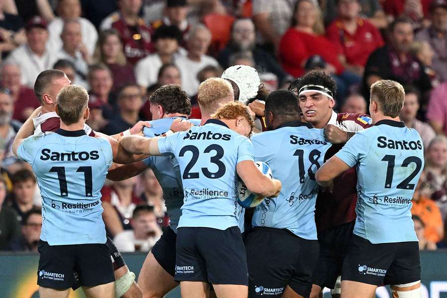 Things get heated during the Super Rugby Pacific clash between NSW Waratahs and Queensland Reds.