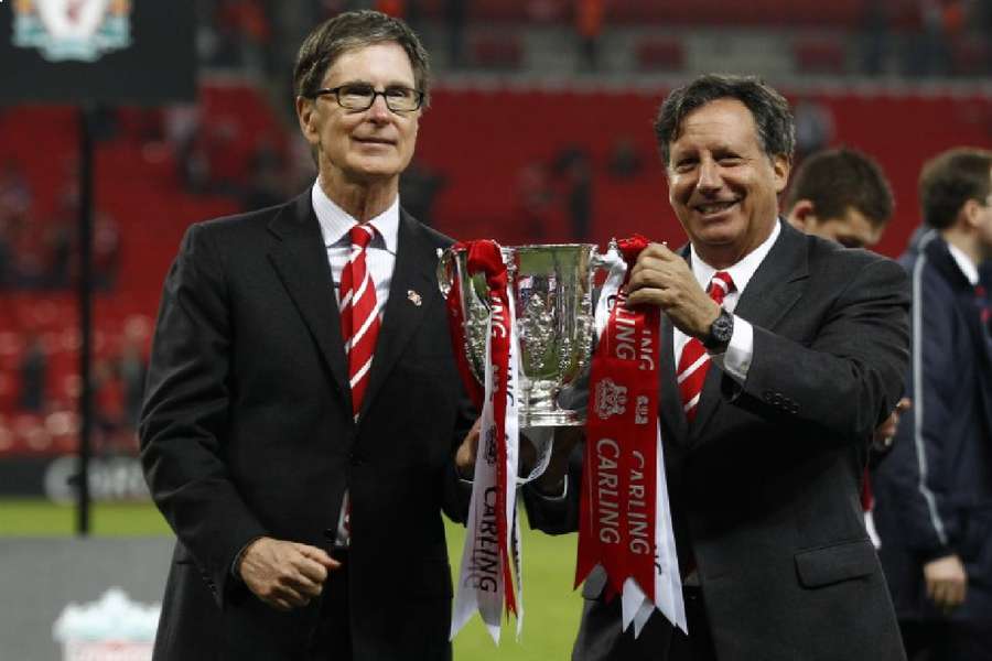 Liverpool and Boston Red Sox owner John W. Henry (L) and chairman Tom Werner