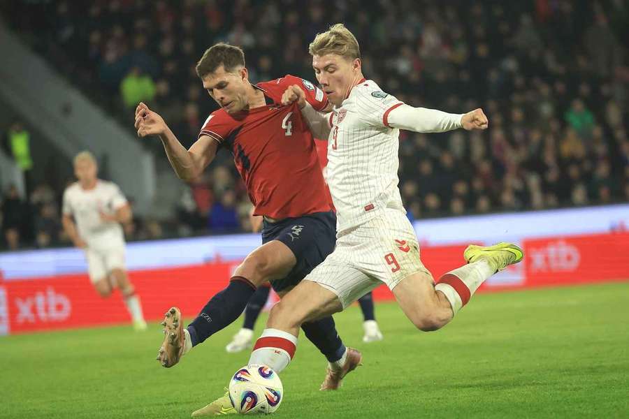 Denmark's Rasmus Hojlund (R) in action against Czech Republic's Robin Hranac (L)