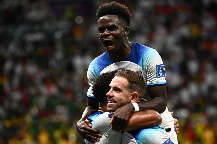 Bukayo Saka celebrates England's opening goal against Senegal.