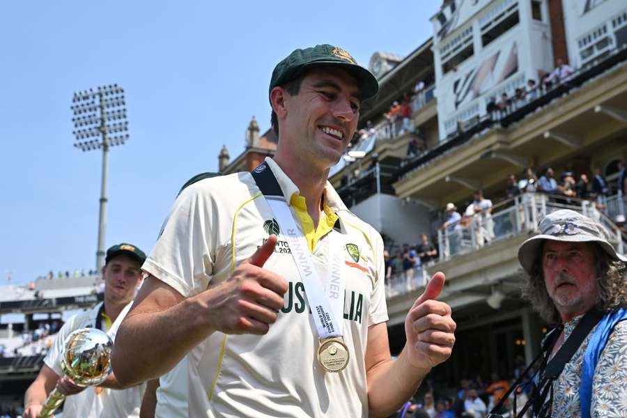 Australia's captain Pat Cummins celebrates their win