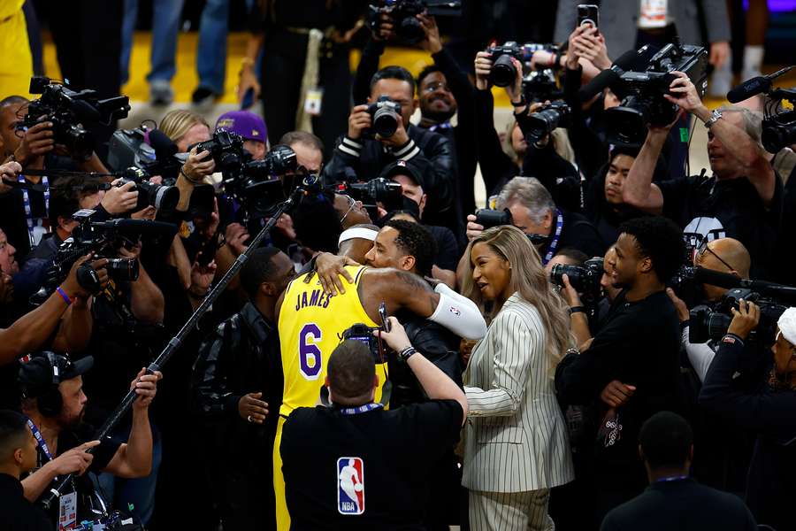 LeBron James celebrates after scoring to pass Kareem Abdul-Jabbar's all-time NBA record