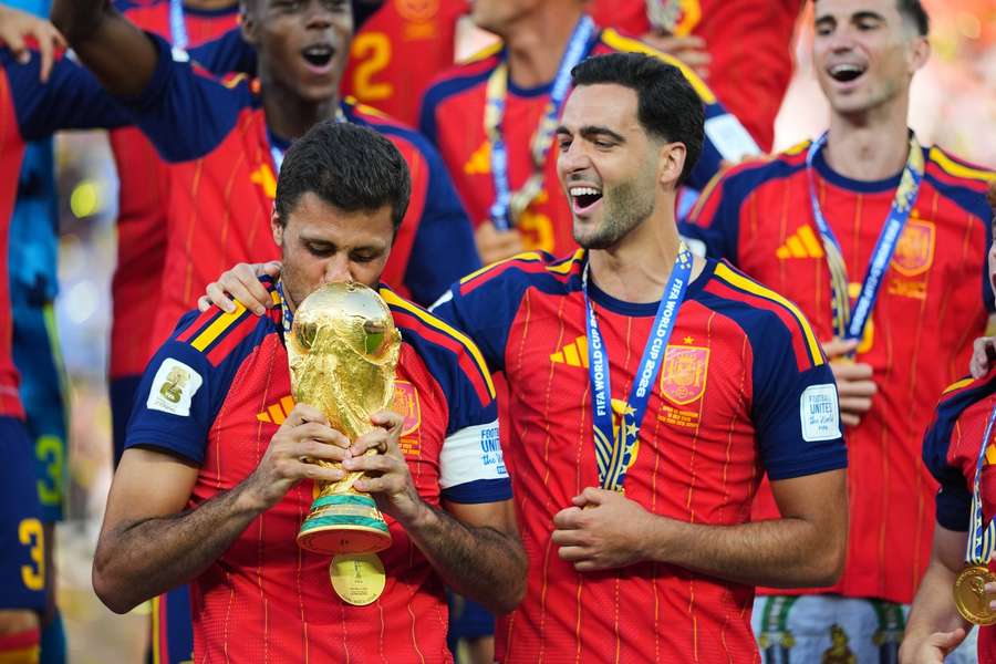 Rodri and Mikel Merino celebrate Spain's World Cup win. Rodri and Mikel Merino celebrate Spain's World Cup win.