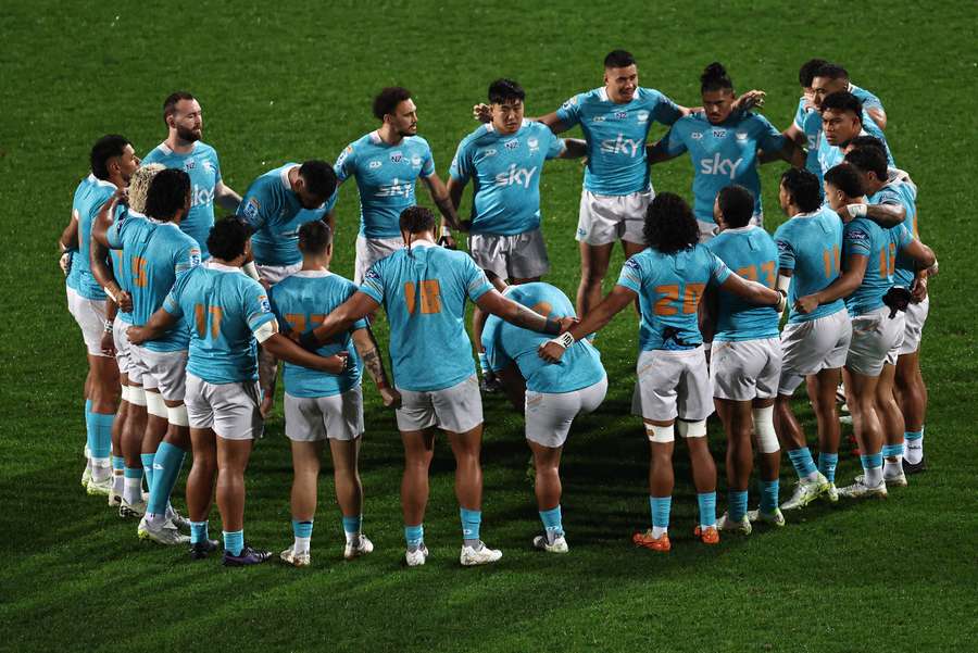 Moana Pasifika players huddle before their weekend Super Rugby loss to the Hurricanes. 