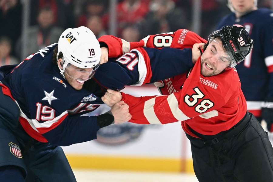 Team USA's Matthew Tkachuk fighting Canada's Brandon Hagel during their 4 Nations matchup (February 15, 2025)