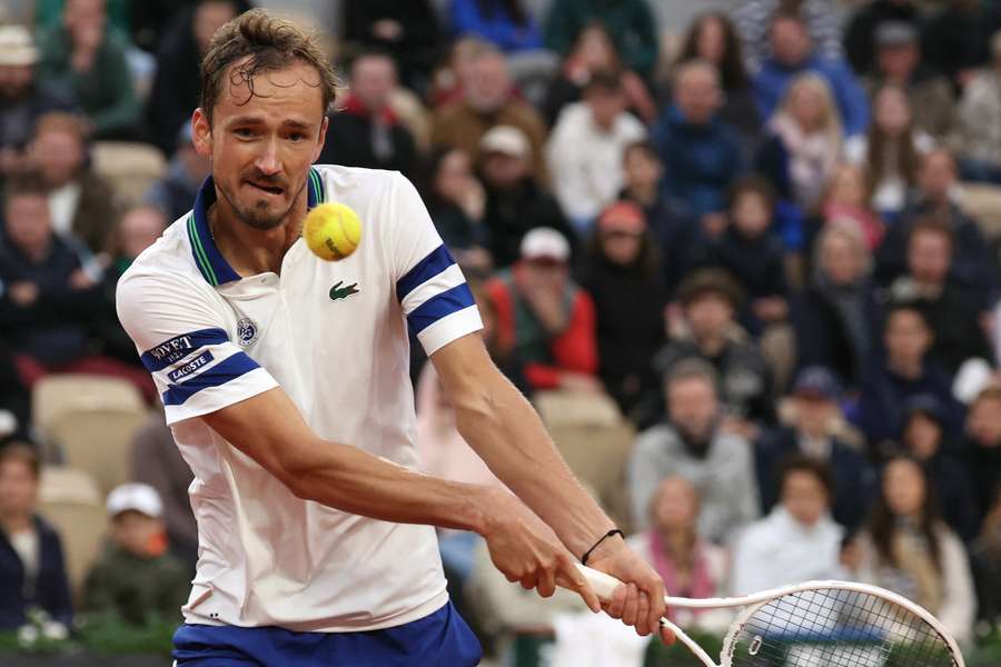 Daniil Medvedev eyes the ball against Tomas Machac