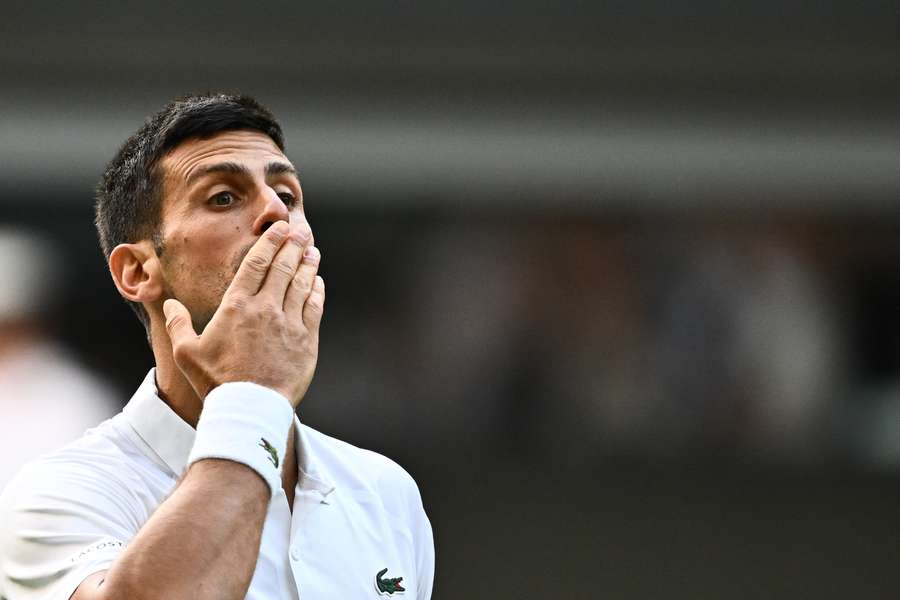 Serbia's Novak Djokovic blows a kiss after winning against Australia's Jordan Thompson
