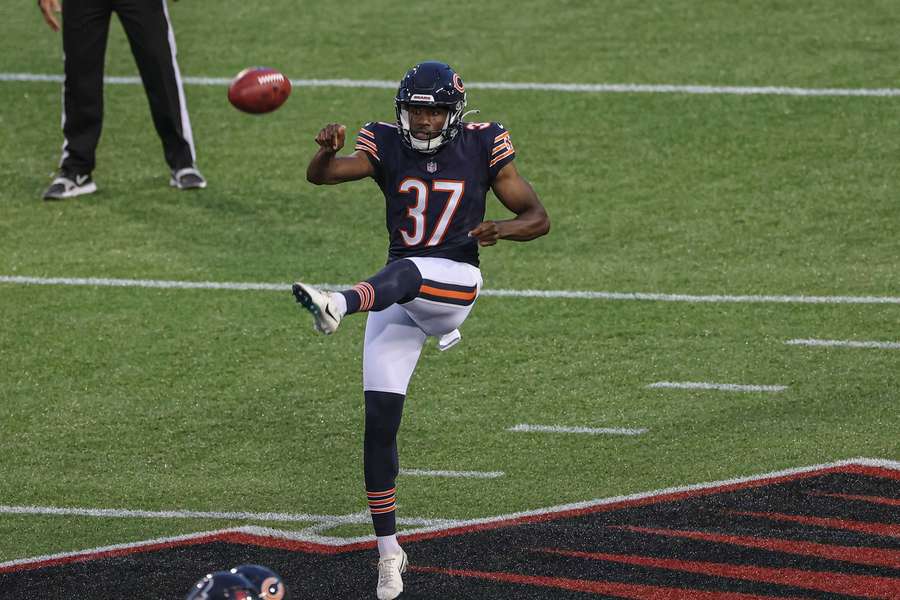 Corliss Waitman in actie voor de Chicago Bears