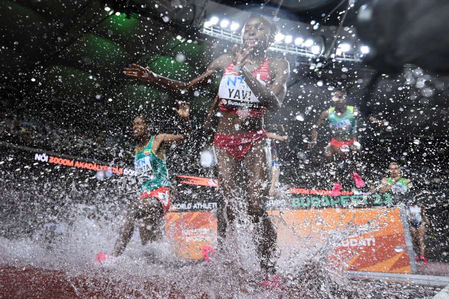 Bahrain's Winfred Mutile Yavi competes in the women's 3,000m steeplechase final