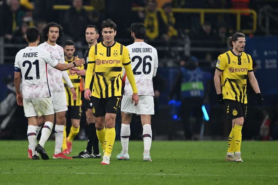 Players react after the game
