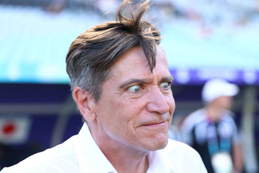 Japan coach Nils Nielsen looking a little... animated, during the group stage. Japan coach Nils Nielsen looking a little... animated, during the group stage.
