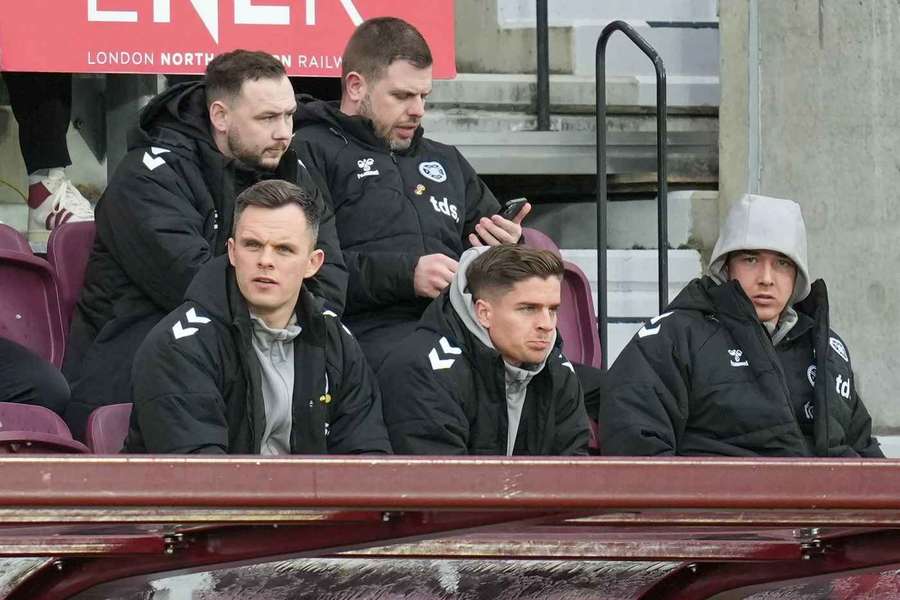 Hearts' injured players watch from the stands Hearts' injured players watch from the stands