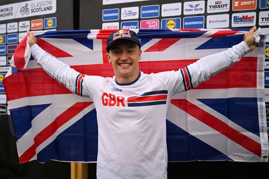 Gold medal winner Great Britaiin's Kieran Reilly celebrates after the men's BMX Freestyle Park Final