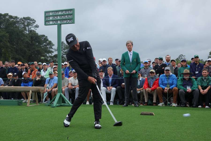 South Africa's Gary Player hits his tee shot on the ceremonial tee off