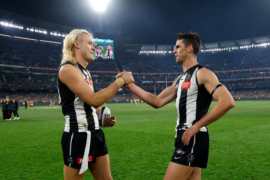 Collingwood are without key pair Darcy Moore and Scott Pendlebury for their annual Easter trip to Brisbane.
