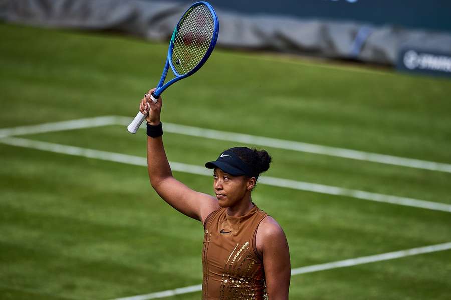 Naomi Osaka celebrates her win