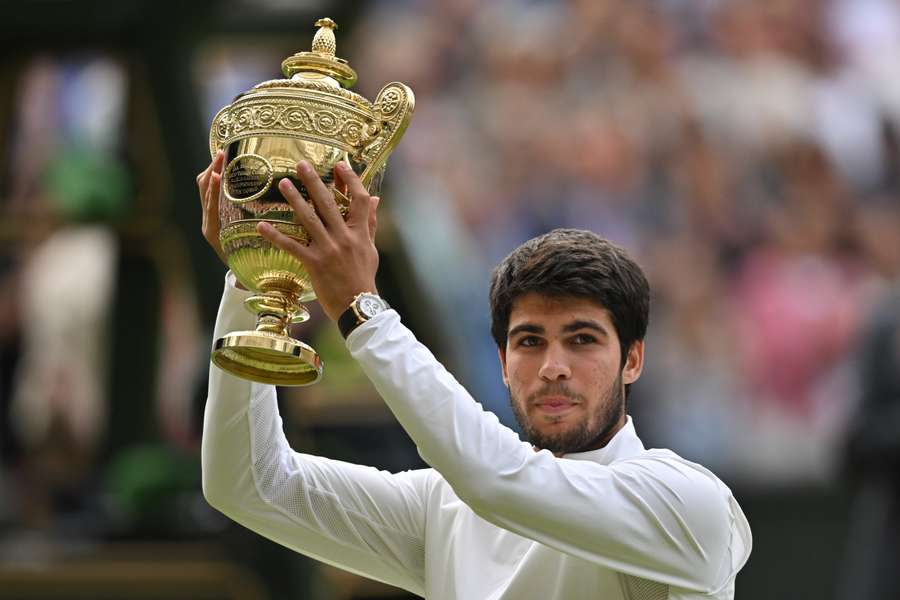 Spain's Carlos Alcaraz celebrates beating Serbia's Novak Djokovic