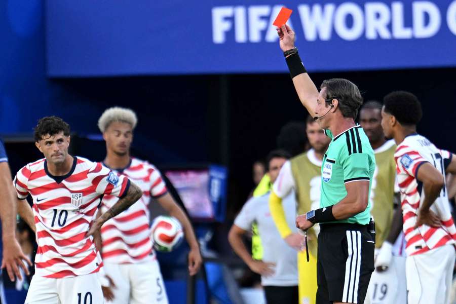 USA players look on stunned as Folarin Balogun (out of photo) is sent off. USA players look on stunned as Folarin Balogun (out of photo) is sent off.