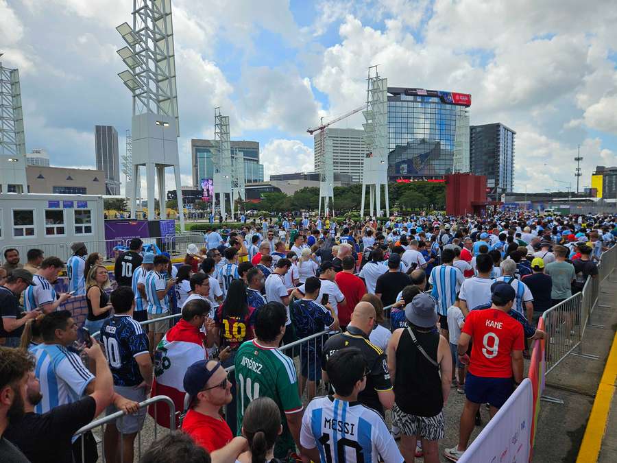 Fans arrive at the Mercedes Benz Stadium Fans arrive at the Mercedes Benz Stadium