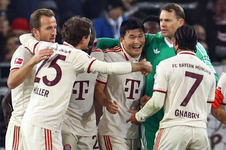 Bayern Munich's Manuel Neuer, Harry Kane, Kim Min-Jae, Thomas Muller and Serge Gnabry celebrate after the match