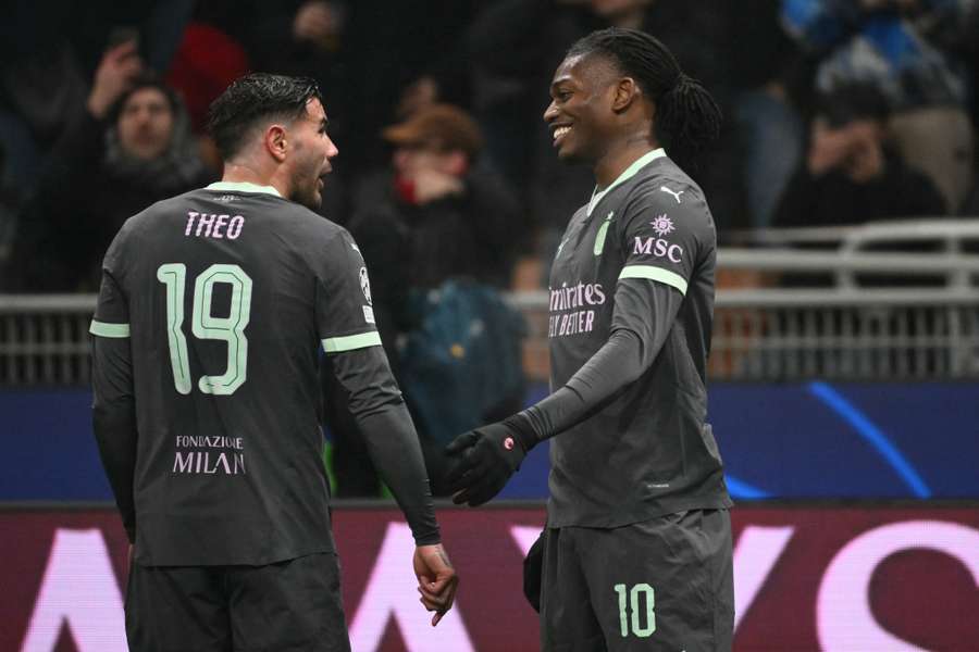 Rafael Leao (right) celebrates his goal