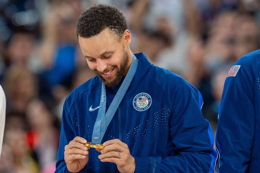 Curry mit seiner Goldmedaille.