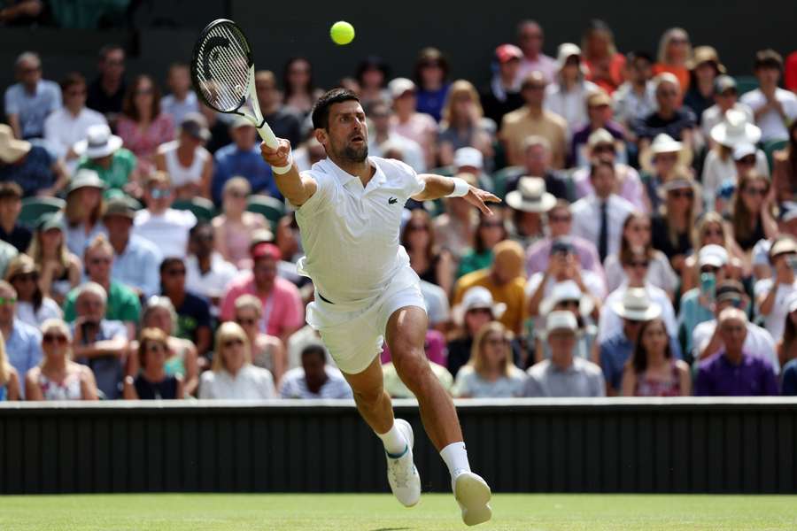 Novak Djokovic returns the ball to Hubert Hurkacz