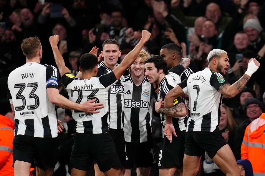 Newcastle celebrate Gordon's goal