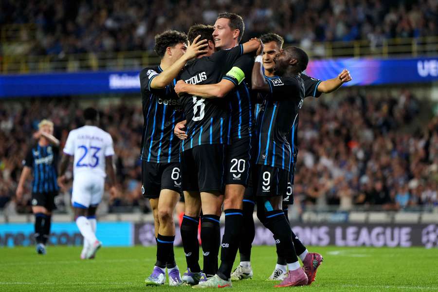 Hans Vanaken celebrates with teammates after scoring Club Brugge's second goal on the night