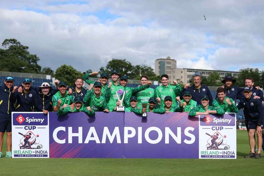 Malan (far right, front row) celebates with his team after the second T20