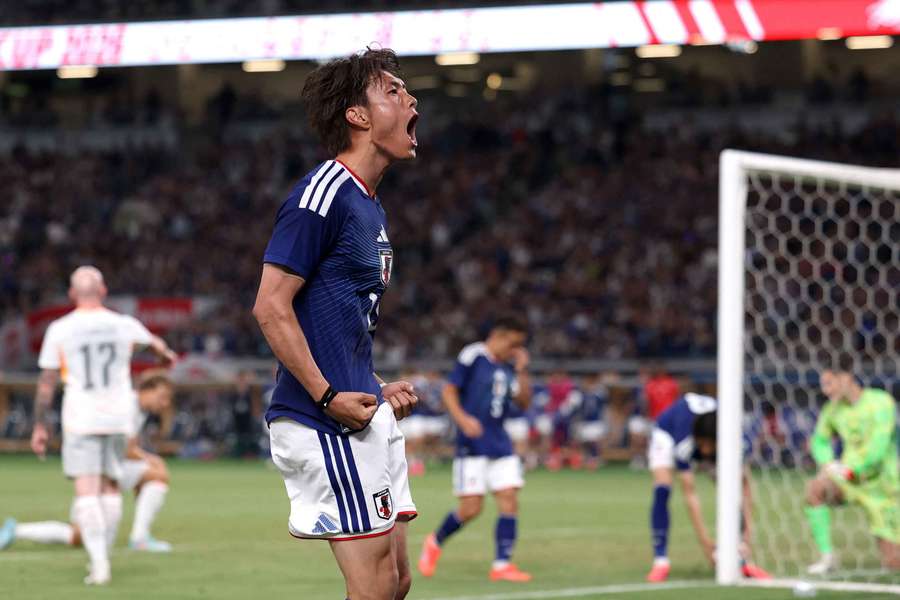 Koki Ogawa celebrates his goal for Japan