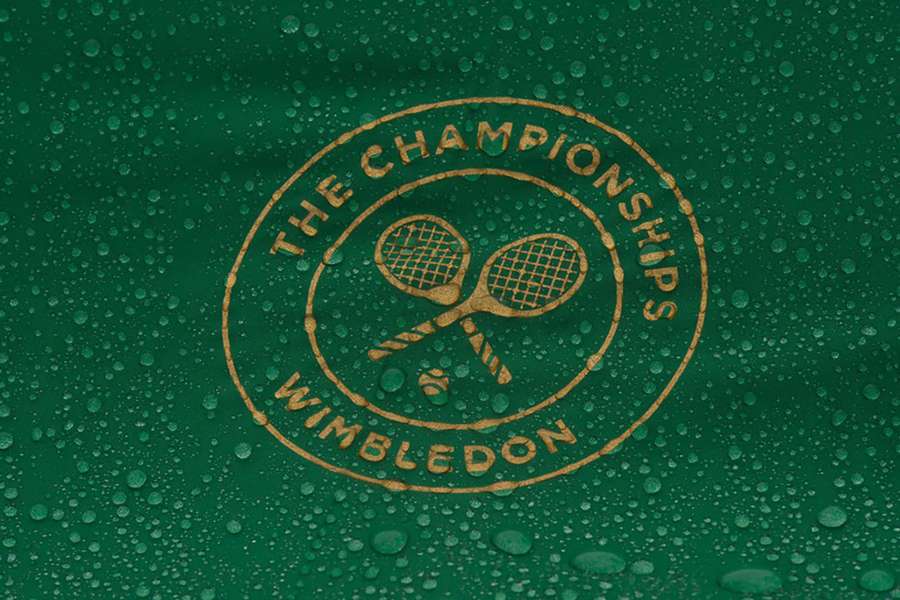 A general view of the Wimbledon logo in the rain