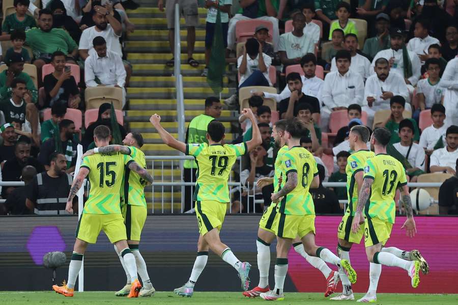 Australia's Mitch Duke celebrates a World Cup qualification goal against Saudi Arabia in Jeddah. Australia's Mitch Duke celebrates a World Cup qualification goal against Saudi Arabia in Jeddah.