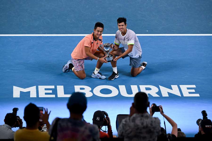 Rinky Hijikata and Jason Kubler pose with the trophy Rinky Hijikata and Jason Kubler pose with the trophy