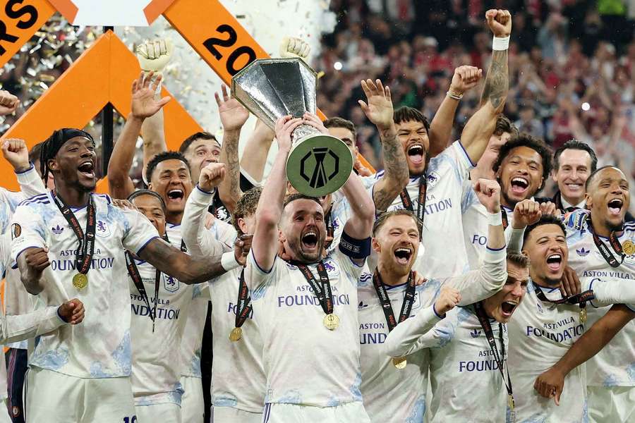 Aston Villa lift the UEFA Europa League trophy after beating Freiburg in the final Aston Villa lift the UEFA Europa League trophy after beating Freiburg in the final