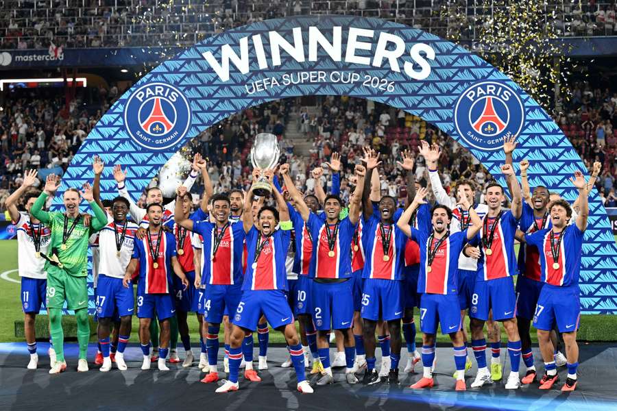 PSG celebrate with the trophy