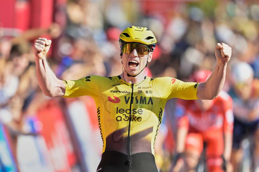 Matthew Brennan celebrates after crossing the line in Manosque