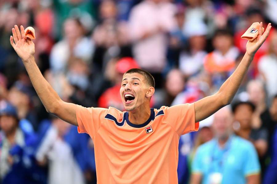 Alexei Popyrin celebrates after beating Taylor Fritz