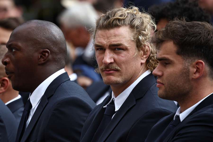 Bastien Chalureau (C) attends a welcoming ceremony for the France team at the Parc du Bois-Préau in Rueil-Malamaison