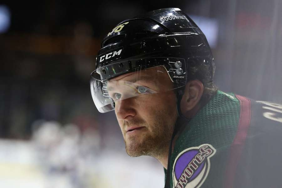 Christian Fischer looks on during warmups prior to a game (2022)