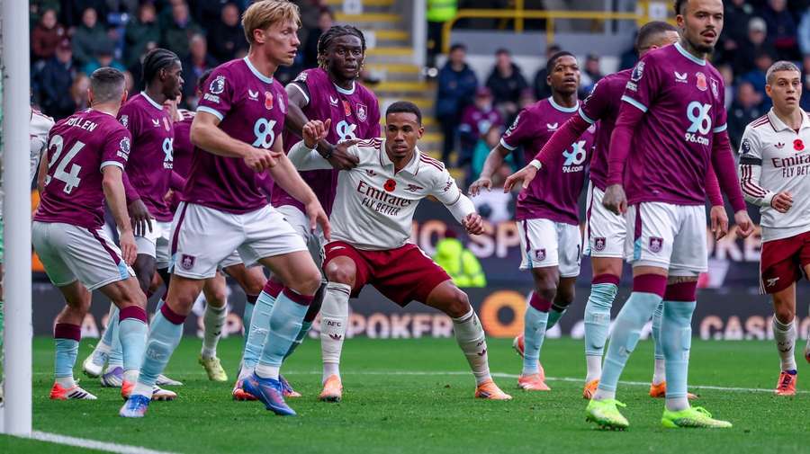 Gabriel is marked by Burnley's players at the weekend