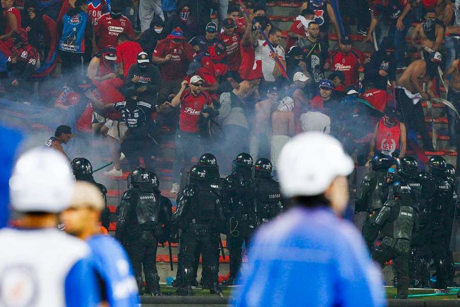 Police stand guard at the end of the Copa Colombia final Police stand guard at the end of the Copa Colombia final