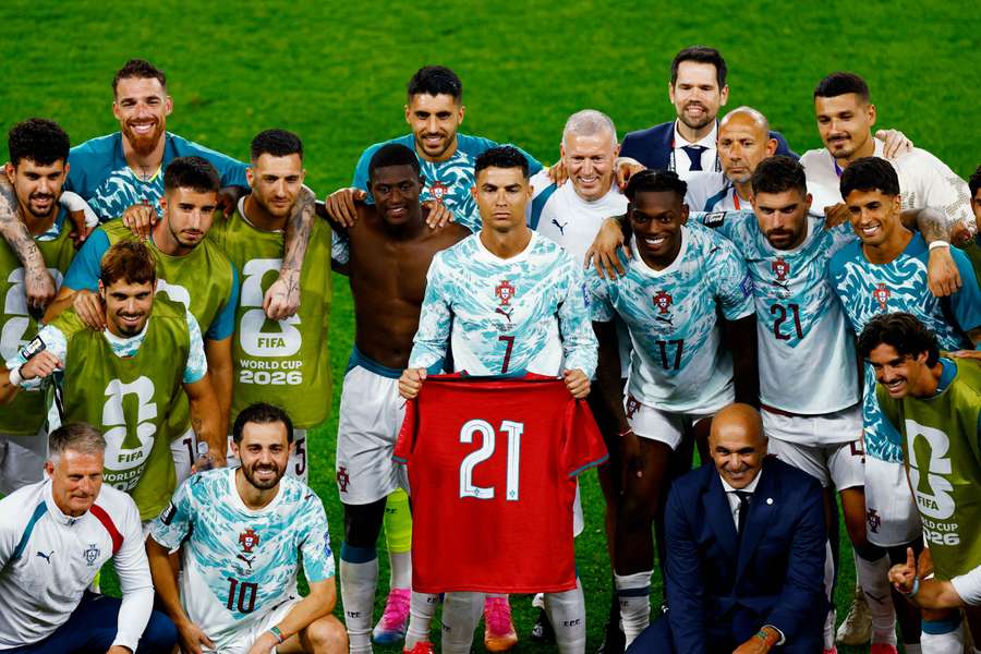Portugal's Cristiano Ronaldo and teammates pose with a shirt in memory of Diogo Jota ahead of the one-year anniversary of his death