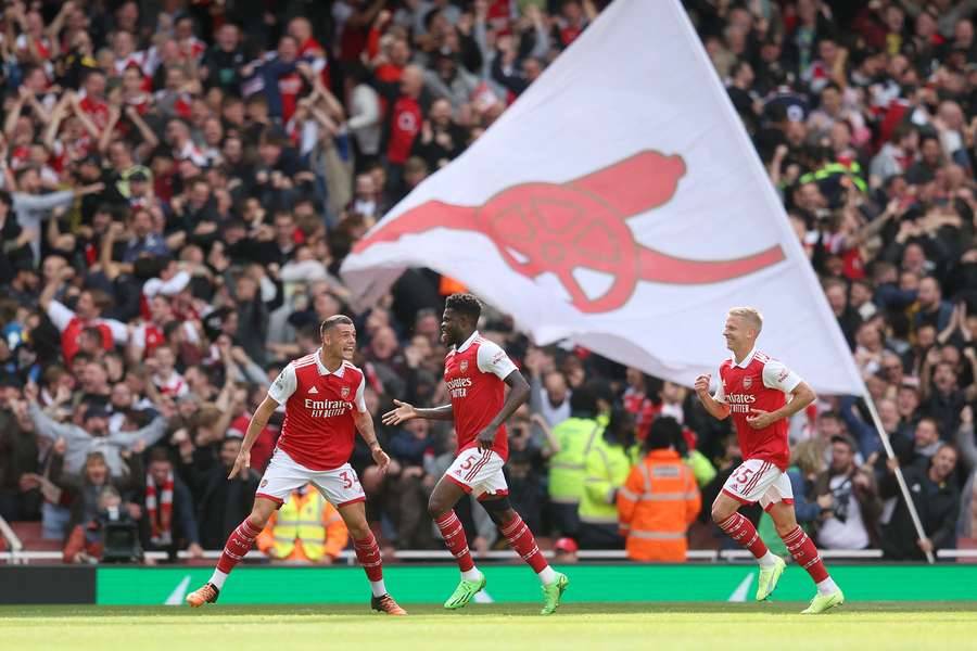 Granit Xhaka and Thomas Partey (left and center) were on target for Arsenal in the derby