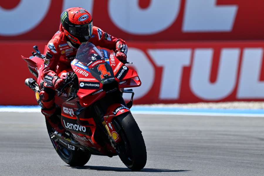 Francesco Bagnaia rides through the Assen course