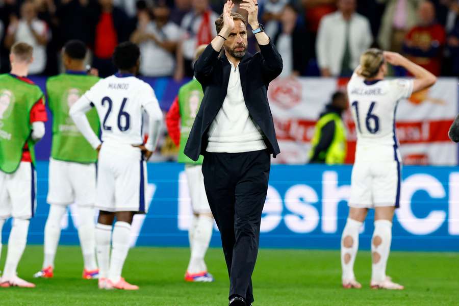 Gareth Southgate applauds the England fans following the win