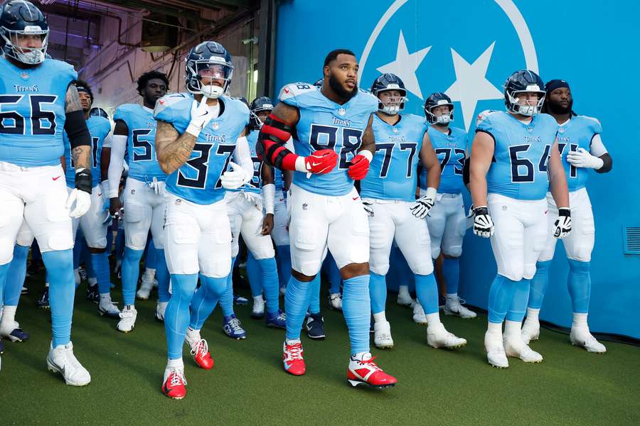 Tennessee Titans captain Jeffrey Simmons leads the team on to the field Tennessee Titans captain Jeffrey Simmons leads the team on to the field